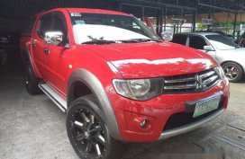 Red Mitsubishi Strada 2011 at 67256 km for sale