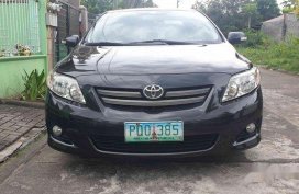 Black Toyota Corolla Altis 2010 at 160000 km for sale 