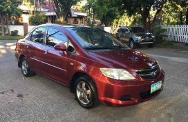 Red Honda City 2006 at 59000 km for sale 