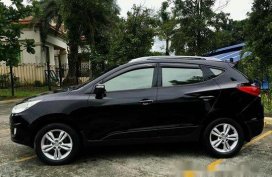 Black Hyundai Tucson 2012 at 50000 km for sale 