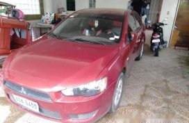 Selling Red Mitsubishi Lancer Ex 2014 Manual Gasoline at 69752 km 