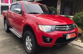 Red Mitsubishi Strada 2014 Automatic Diesel for sale 