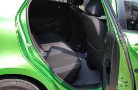 Green Mazda 2 2013 Hatchback Automatic Gasoline for sale