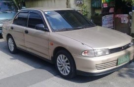 Beige Mitsubishi Lancer 1993 Manual Gasoline for sale