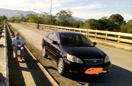 Black Toyota Corolla Altis 2005 at 125000 km for sale