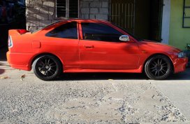 Selling Red Mitsubishi Lancer 1998 Manual Gasoline 