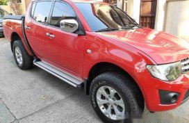 Sell Red 2014 Mitsubishi Strada at 92000 km