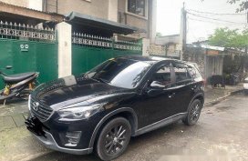 Black Mazda Cx-5 2016 at 32000 km for sale 