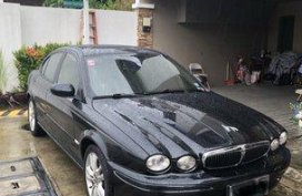 Black Jaguar X-Type 2008 at 12000 km for sale