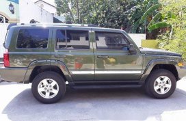 Green Jeep Commander 2008 at 109000 km for sale 