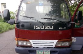 Selling Red Isuzu Elf 2009 Truck in Cavite 