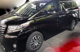 Black Toyota Alphard 2016 at 23000 km for sale
