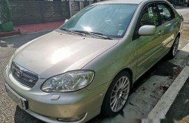 Selling Beige Toyota Corolla Altis 2005 