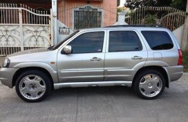 Selling Silver Mazda Tribute 2004 at 82000 km