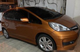 Orange Honda Jazz 2013 Automatic Gasoline for sale