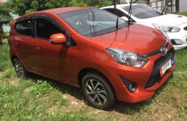 Orange Toyota Wigo 2018 for sale in Cainta