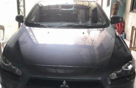 Grey Mitsubishi Lancer Ex 2010 Automatic Gasoline for sale 