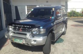Blue Mitsubishi Pajero 1999 Automatic Gasoline for sale 