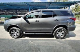 Black Toyota Fortuner 2016 at 13000 km for sale