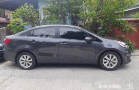 Selling Grey 2016 Kia Rio at 24500 km
