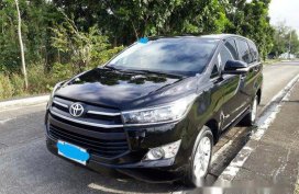 Selling Black Toyota Innova 2017 at 35000 km