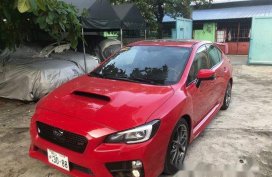 Red Subaru Wrx 2015 at 21000 km for sale 