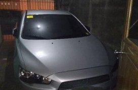 Selling Silver Mitsubishi Lancer ex 2014 Automatic Gasoline 