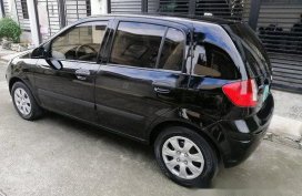 Black Hyundai Getz 2010 at 82000 km for sale 
