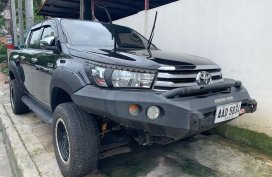 Black Toyota Hilux 2016 for sale in Quezon City