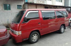 Selling Red Nissan Urvan 2005 at 13000 km 