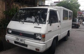 Selling White Mitsubishi L300 2002 in Paranaque