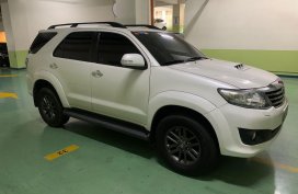 Pearl White Toyota Fortuner 2013 for sale in Makati