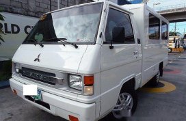 Selling White Mitsubishi L300 2014 in Quezon City