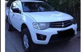 Sell White 2012 Mitsubishi Strada in Concepcion