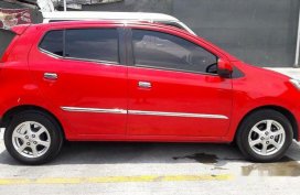 Red Toyota Wigo 2016 for sale in Quezon City 