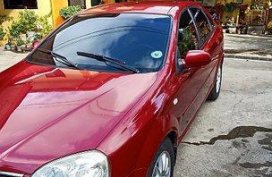 Sell Red 2004 Chevrolet Optra in Manila