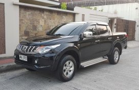 Black Mitsubishi Strada 2015 for sale in Automatic