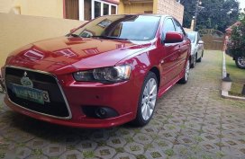 Sell Red 2010 Mitsubishi Lancer in Manila