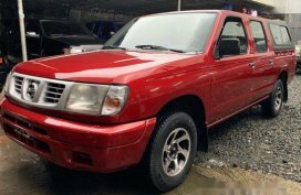Red Nissan Frontier Navara 2009 for sale in Quezon City 