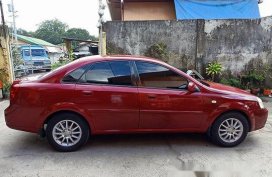 Sell Red 2004 Chevrolet Optra Manual Gasoline 