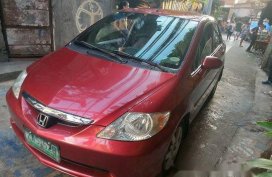 Red Honda City 2005 at 95000 km for sale 