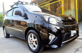 Selling Black Toyota Wigo 2014 in Manila
