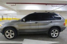 Selling Silver Bmw X5 2006 at 70000 km 
