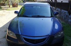Selling Blue Mazda 3 2007 at 96603 km