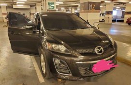 Black Mazda Cx-7 2011 at 60000 km for sale 