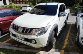White Mitsubishi Strada 2017 for sale in Silang