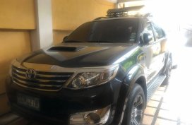 Selling Black Toyota Fortuner 2013 in Manila