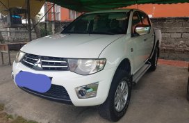 White Mitsubishi Strada 2014 for sale in Manila