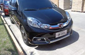 Black Honda Mobilio 2015 SUV / MPV at Automatic  for sale in Calamba