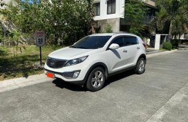 Sell White 2013 Kia Sportage in Taguig